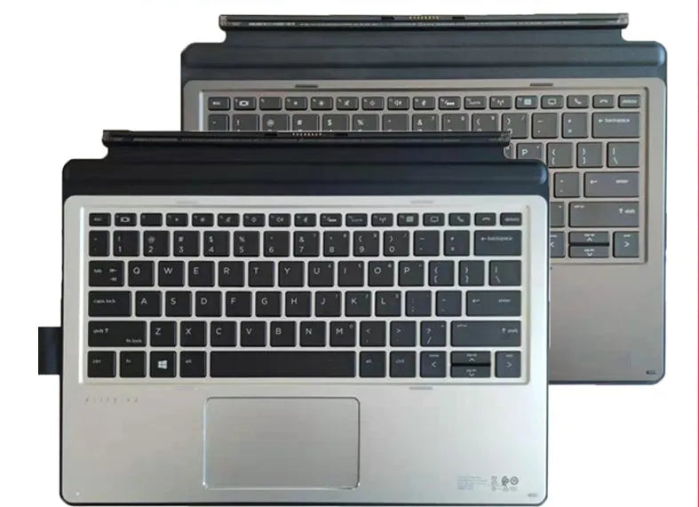 Official HP Elite X2 and Pro X2 tablet base keyboard with PS/2 connector on a desk.