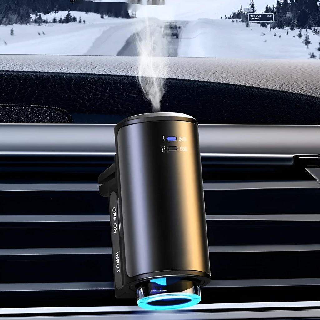 Obsidian black car vent clip aroma diffuser with essential oil bottle on a car air vent