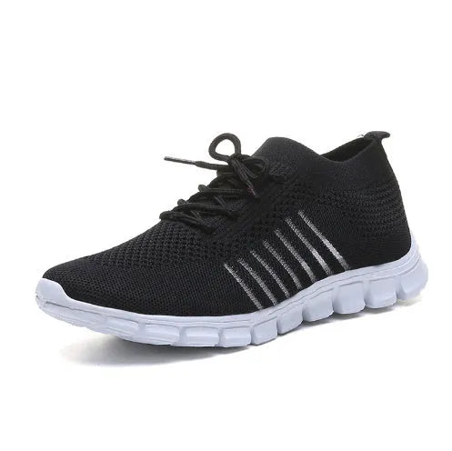 Women's lace-up platform sneakers in various colours with flat rubber soles