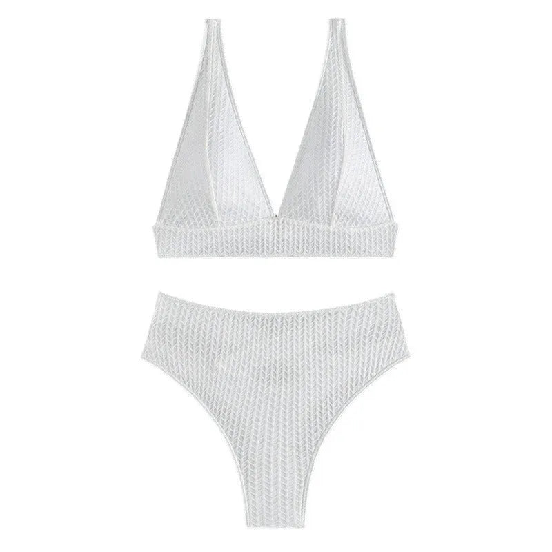 White backless women's bikini swimsuit on a mannequin
