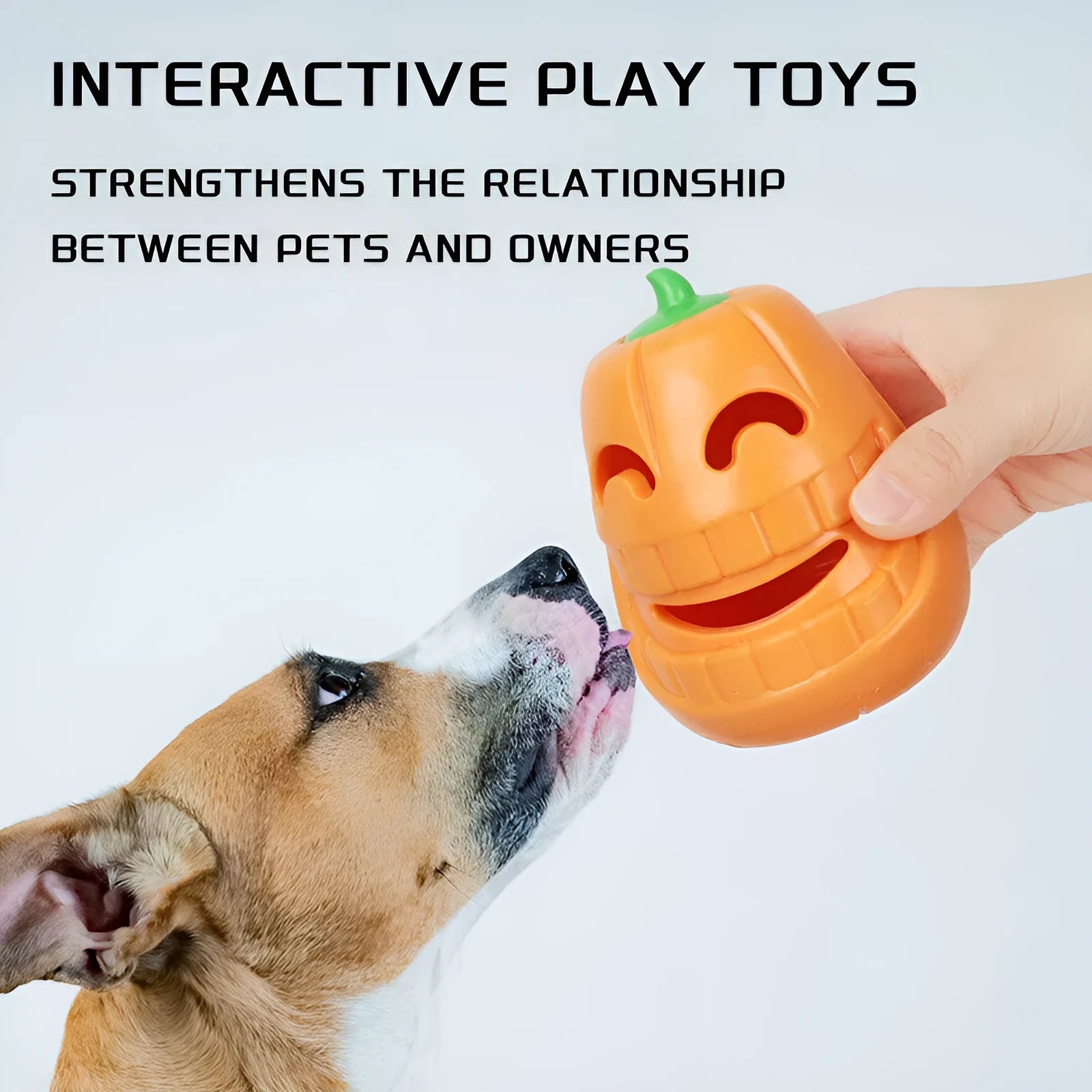 Halloween pumpkin shaped interactive dog chew toy with treat-dispensing funnel design