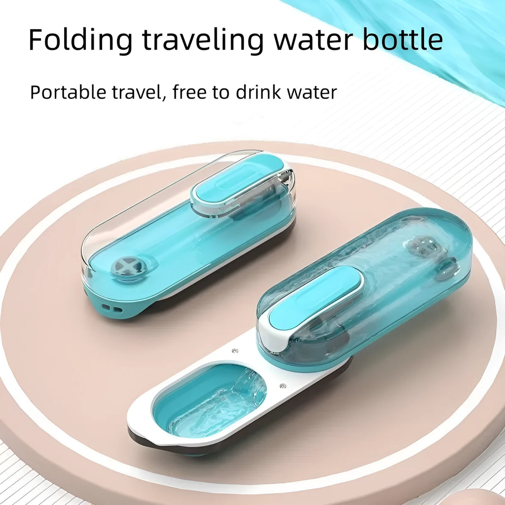 Portable blue dog water bottle with a foldable silicone drinking bowl and carabiner clip