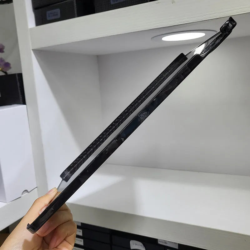 Carbon fibre flat protective cover for iPad Pro 11 inch in a plaid design with embossing.
