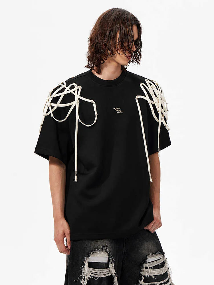 Black loose fit T-shirt with rivet ribbon padded shoulder detailing and short sleeves