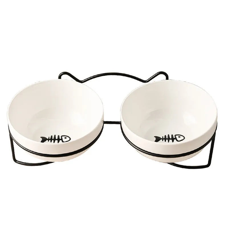 White ceramic cat bowl with decorative iron frame in cat ear design