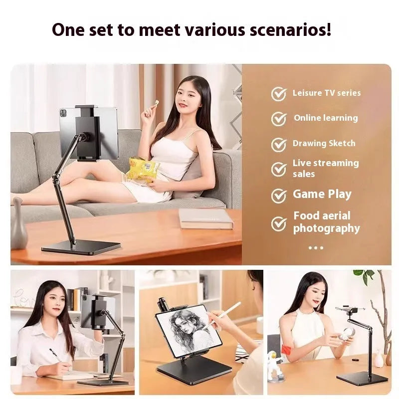 Silver alloy desktop phone and tablet bracket with double adjustable arms and a remote control on a wooden desk.