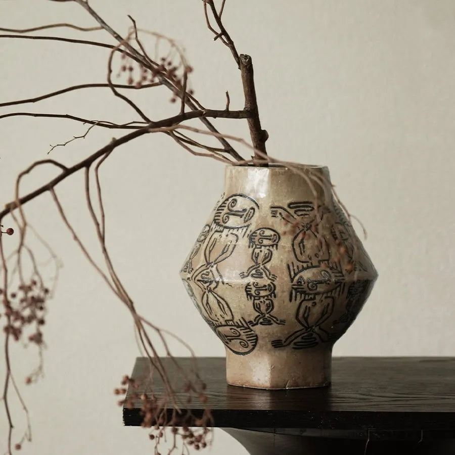 Ceramic cylindrical vase with hand-painted vintage carved tribal totem artwork