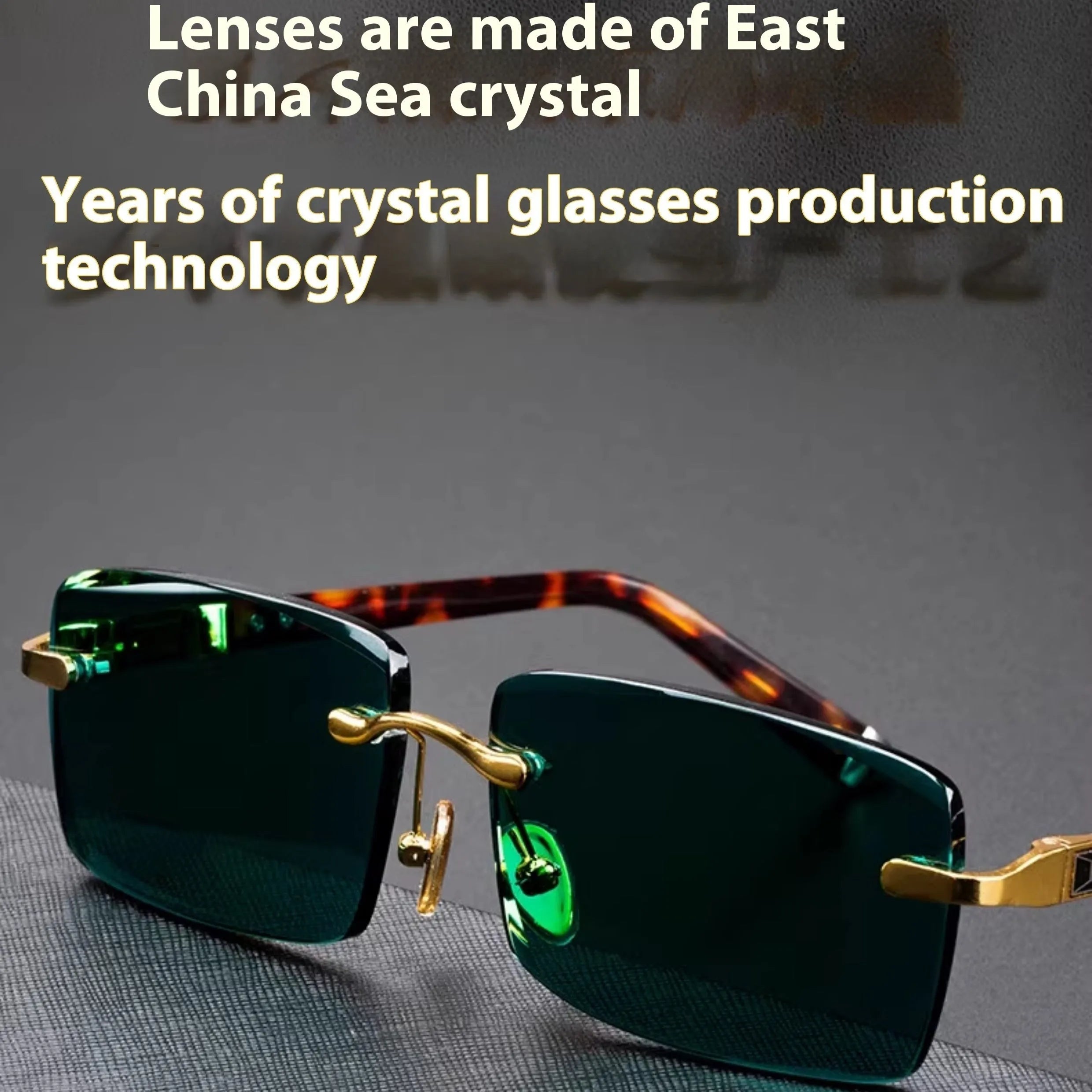 Dark green frameless crystal sunglasses inside a protective case with a lens cloth.
