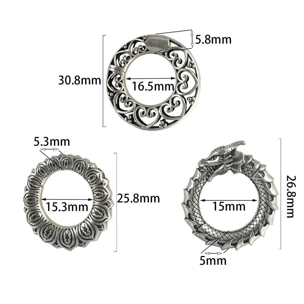 Large hollow out stainless steel earrings with an antique silver dragon design.