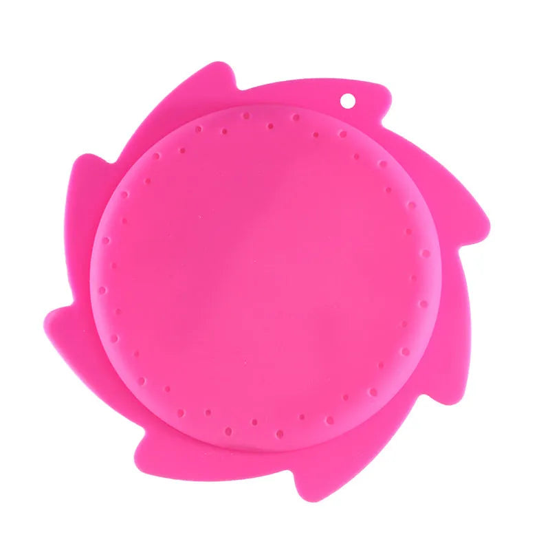 Silicone water toy in blue expression style on a wet surface for bath play