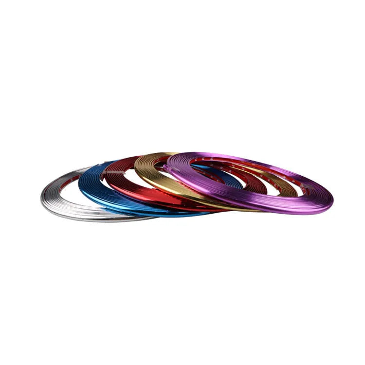 Galvanised purple PVC wheel hub trim protection strip on car alloy wheel