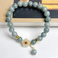 Women's handmade jade bracelet with adjustable rope fastening in retro style