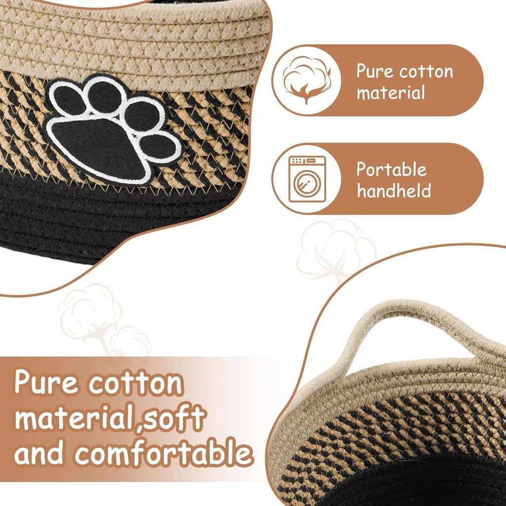 Light beige handmade woven cotton rope storage basket with wooden handle.