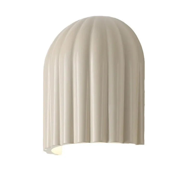 Modern simple decorative wall lamp in beige with full spectrum warm light, metal ironwork and resin construction