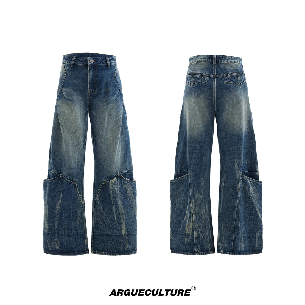 Men's verdant blue jeans with retro washed burst pattern and curved knife silhouette in loose fit