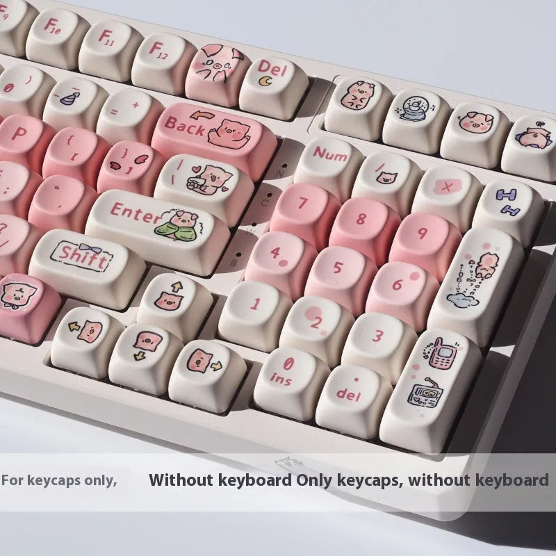 Pink PBT key cap with fragrant pig design on all five sides, shown with keycap puller tool