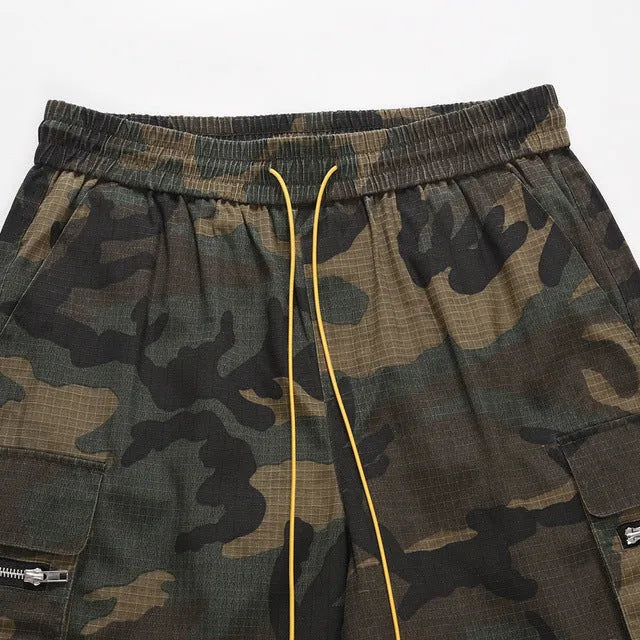 Green H215 washed camouflage cotton work shorts with multiple pockets in mid-waist loose fit