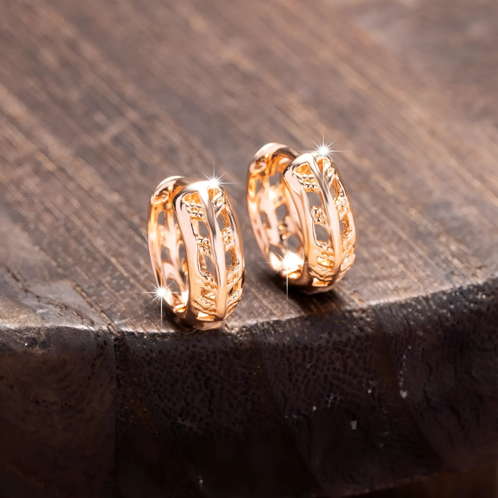 Rose gold copper leaf hollowed out earrings with a heart shape design.