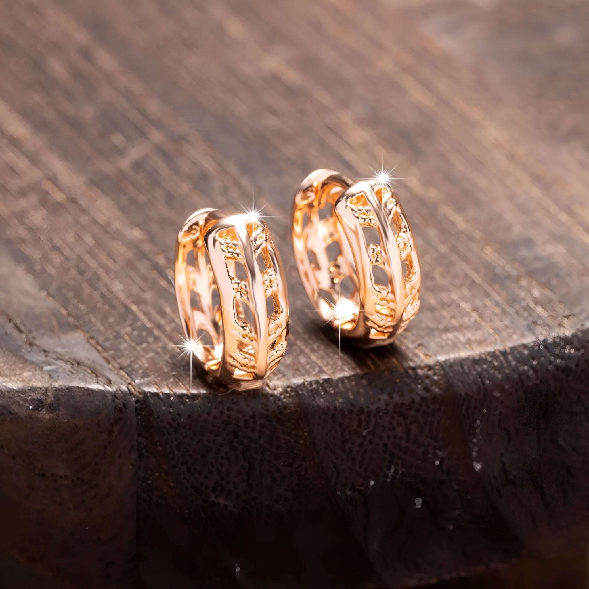 Rose gold copper leaf hollowed out earrings with a heart shape design.