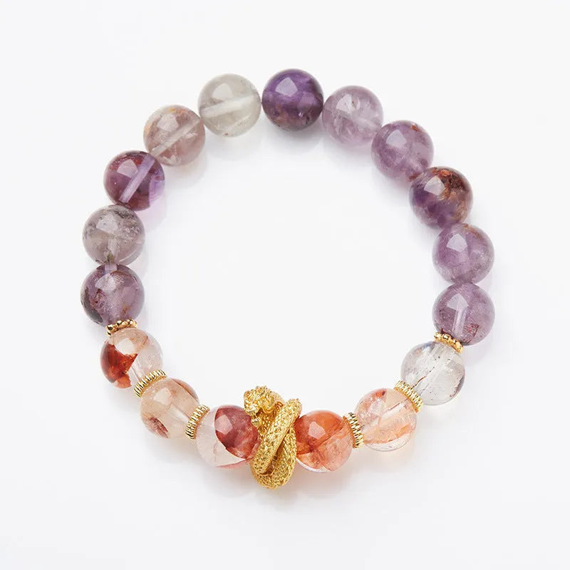 Purple ghost stone nine purple good luck crystal bracelet with 10mm beads and animal zodiac design.