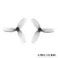 Set of four 31mm 3-blade PC propeller blade accessories in clear, gray, purple, and red on white background