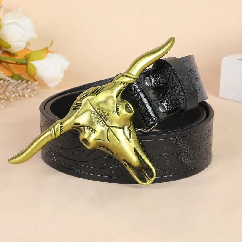 Men's belt with detailed cow head alloy buckle on imitation leather strap with pin buckle fastening