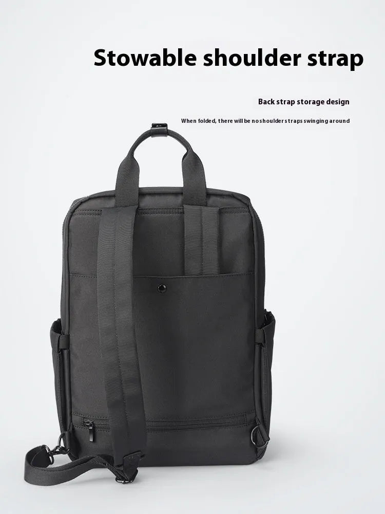 Elegant black Oxford cloth computer backpack with a capacity of 20-35 litres.