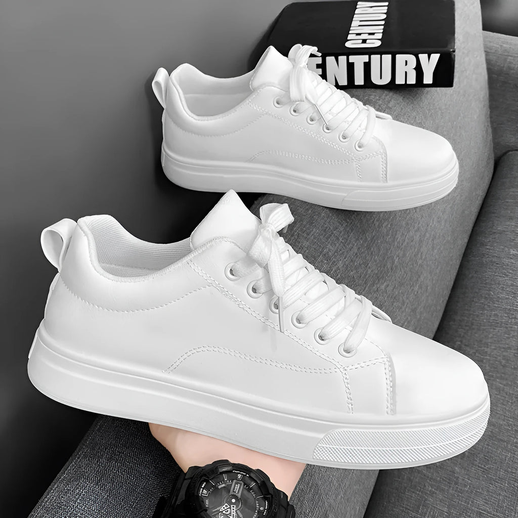 Men's low-top casual sneakers in white, black, and black with white bottom colour options.