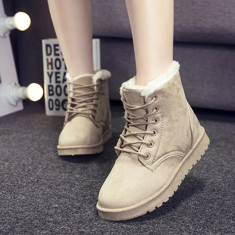 Women's lace up platform snow boots in suede with faux fur lining, flat heel, round toe, available in multiple colours