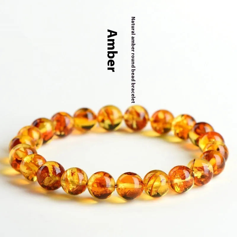 Natural yellow piebald amber bracelet with geometry beads showing flower spot patterns