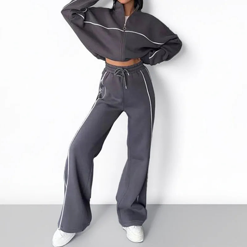 Two-piece striped casual suit with zip-front hoodie and matching trousers in various colours