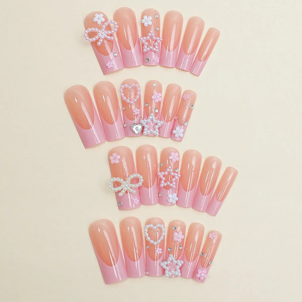 Super long water pipe shaped artificial nails with French spot drill and a bow detail in colour XB-70-48.