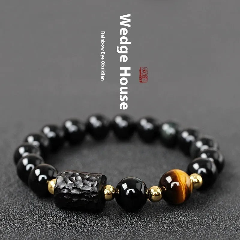 Obsidian bracelet with 10mm yellow tiger eye beads showing manual processing details and retro circle style