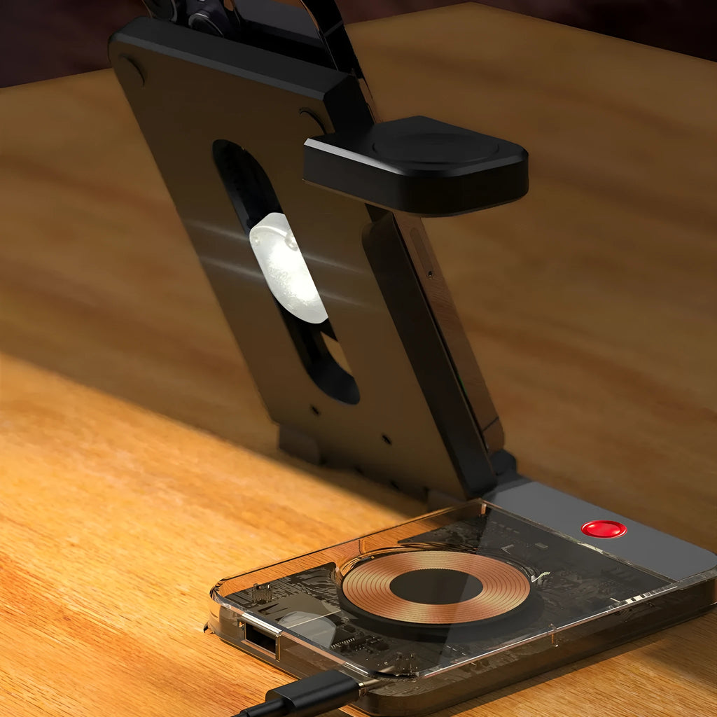 Black foldable three-in-one magnetic wireless charging stand for phones, watches, and headphones on desktop