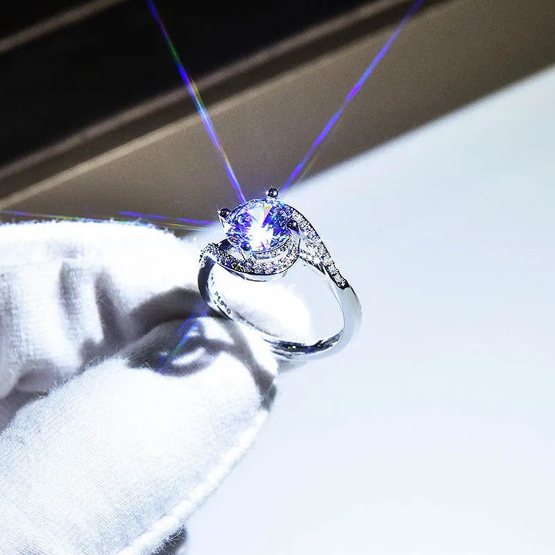 Silver geometric copper women's ring with adjustable opening and a large round zircon stone.