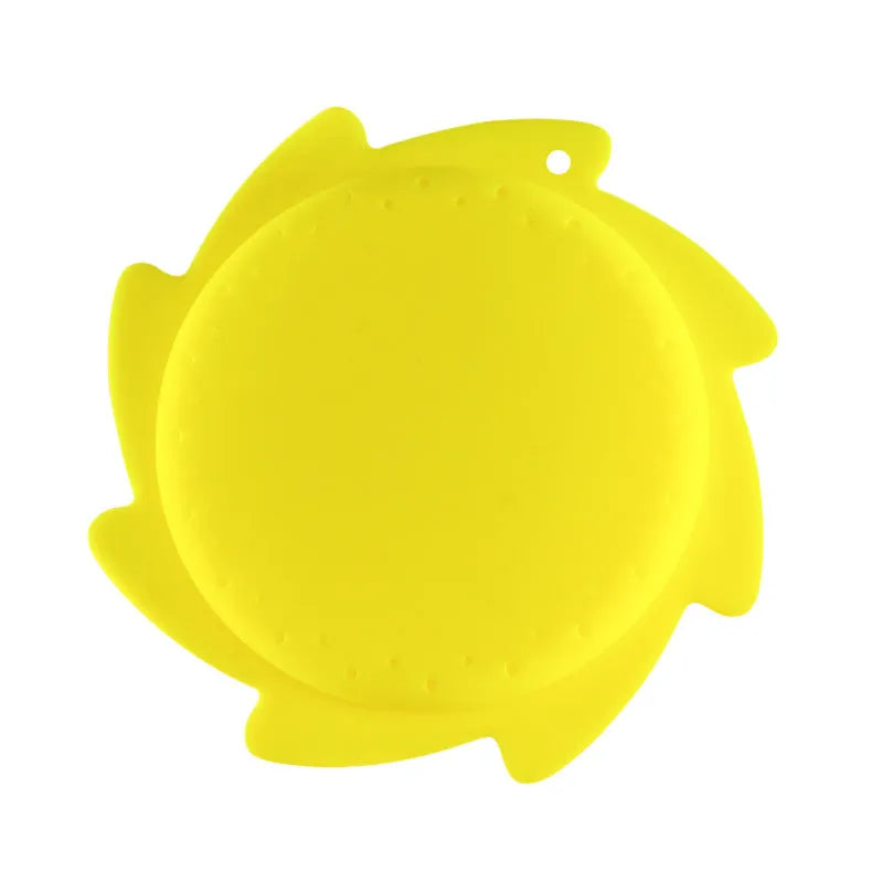 Silicone water toy in blue expression style on a wet surface for bath play