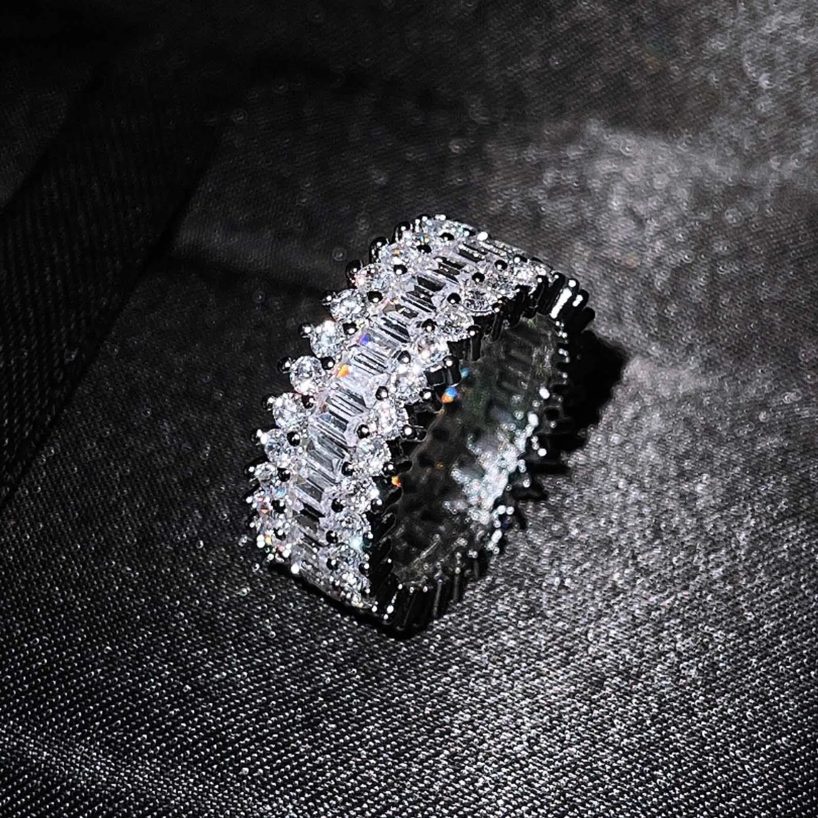Geometric copper ring with zircon inlay in rose gold finish on neutral background