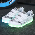 Children's USB rechargeable LED light-up sneakers in white with colourful glowing lights and hidden switch