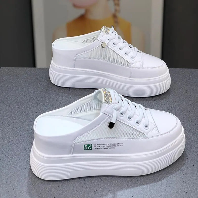 White women's mesh platform shoes with round toe and rubber sole.
