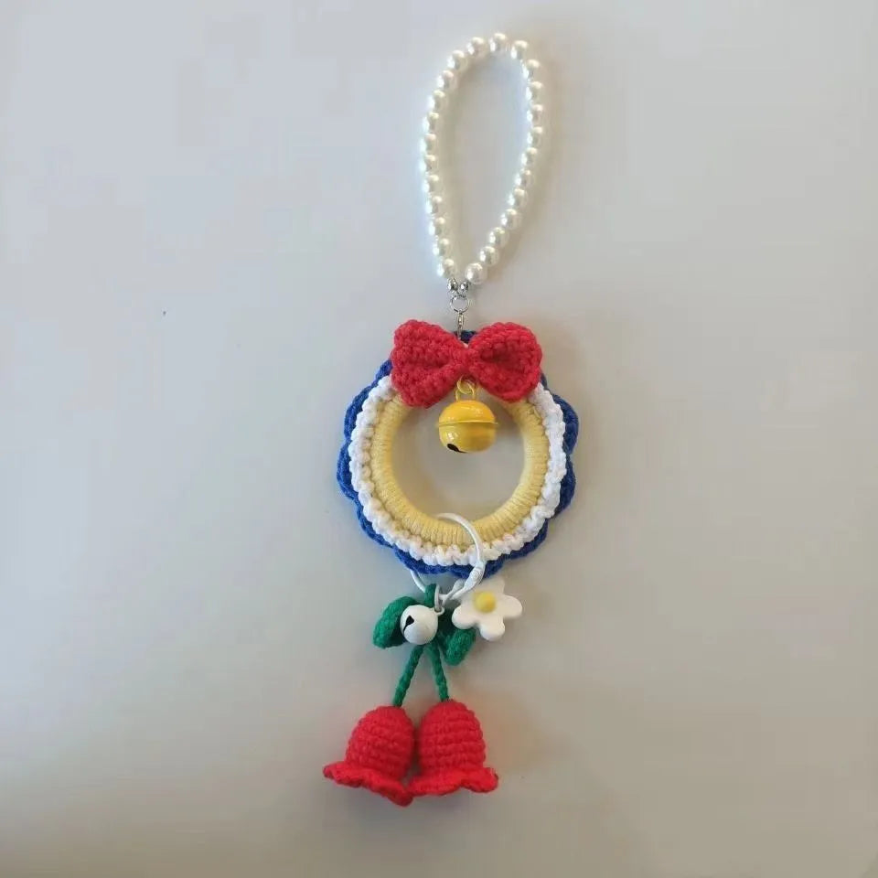 Snow White plush handmade yarn weaving car hanging pendant on a red wind chime.