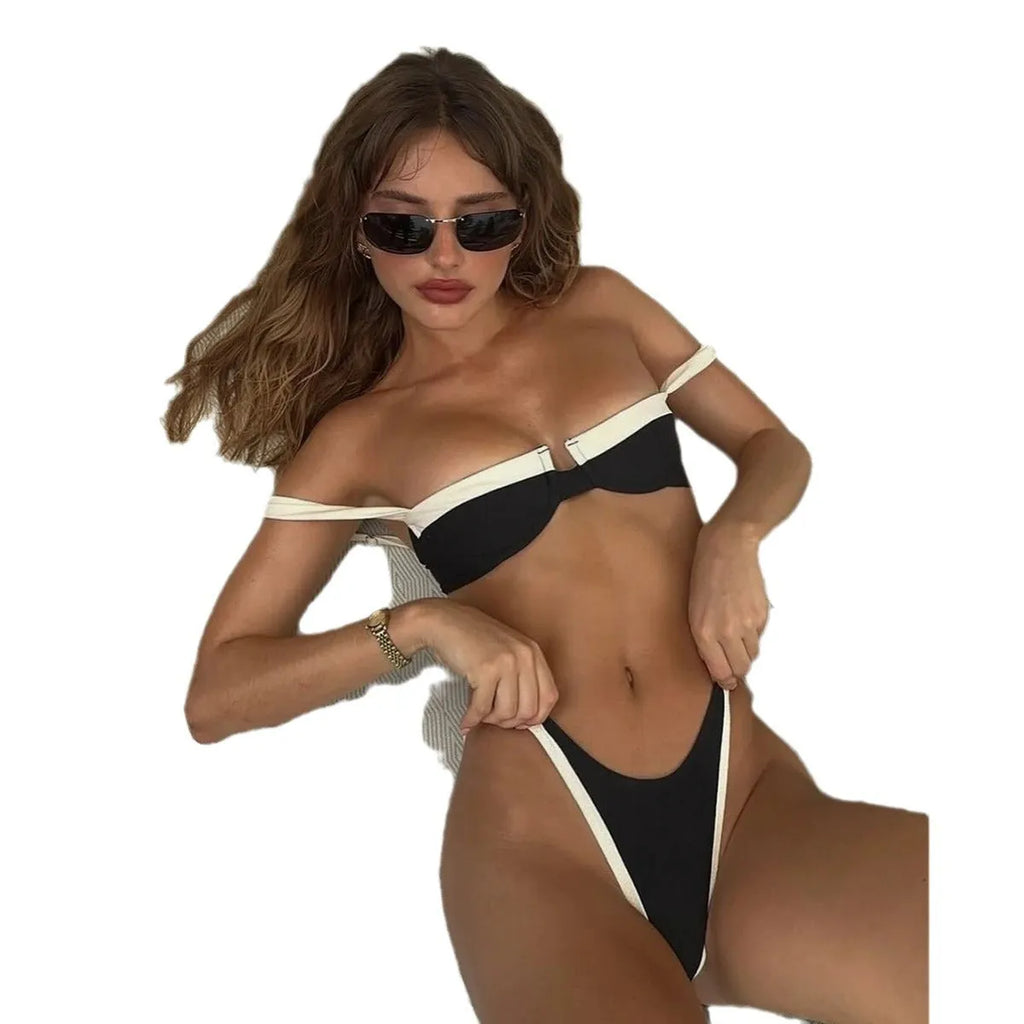 Black women's bikini briefs with stitching, showing front and back views