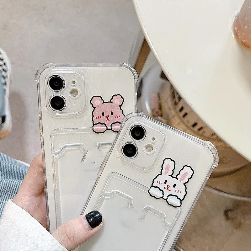 Cartoon design transparent TPU phone case with integrated card holder for Apple iPhone.