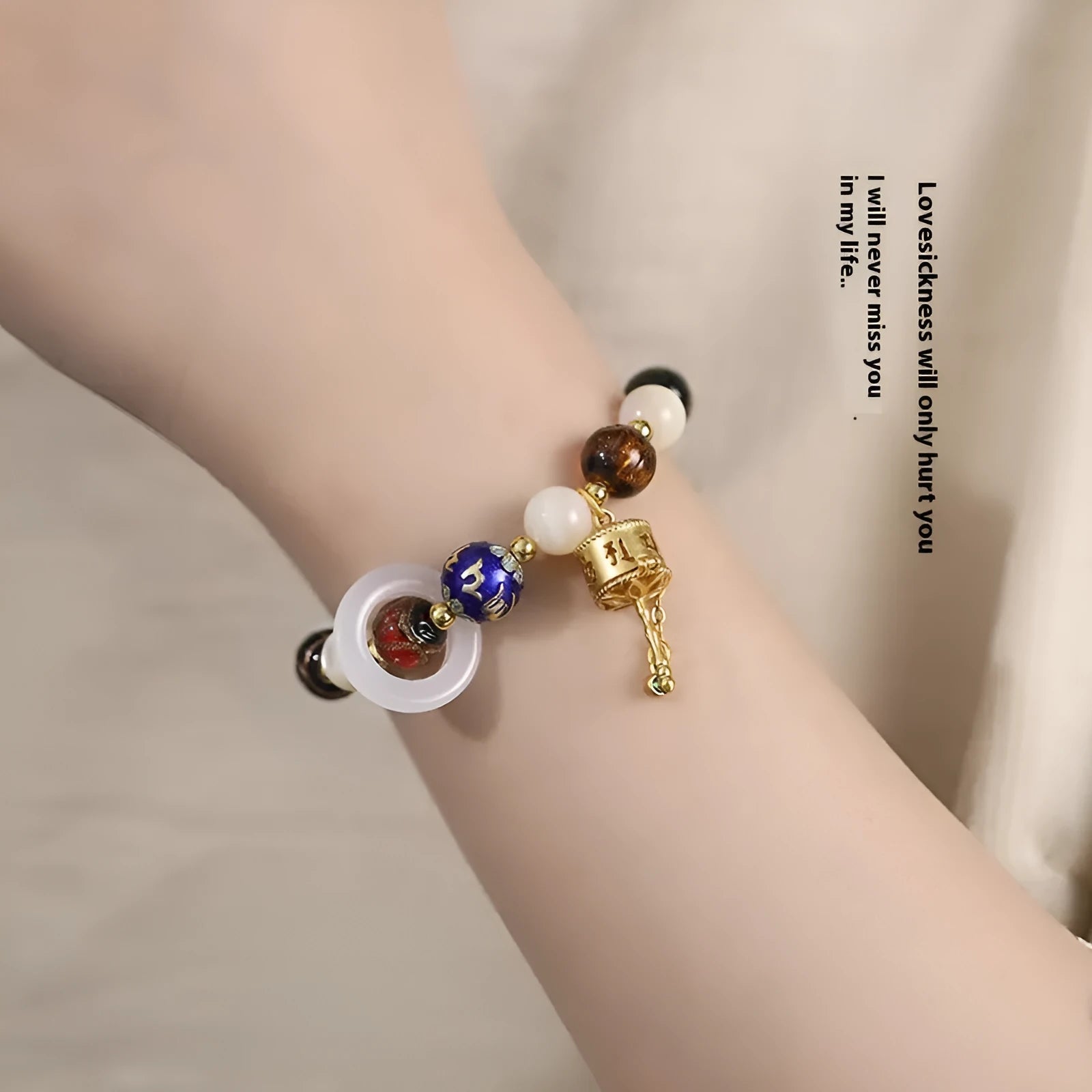 Hand-woven women's bracelet with fragrant grey coloured glaze beads and accent stones
