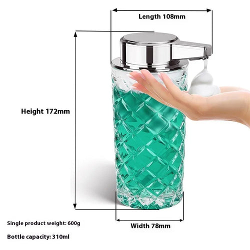 Silver automatic soap dispenser with USB Type-C charging port on a bathroom counter.