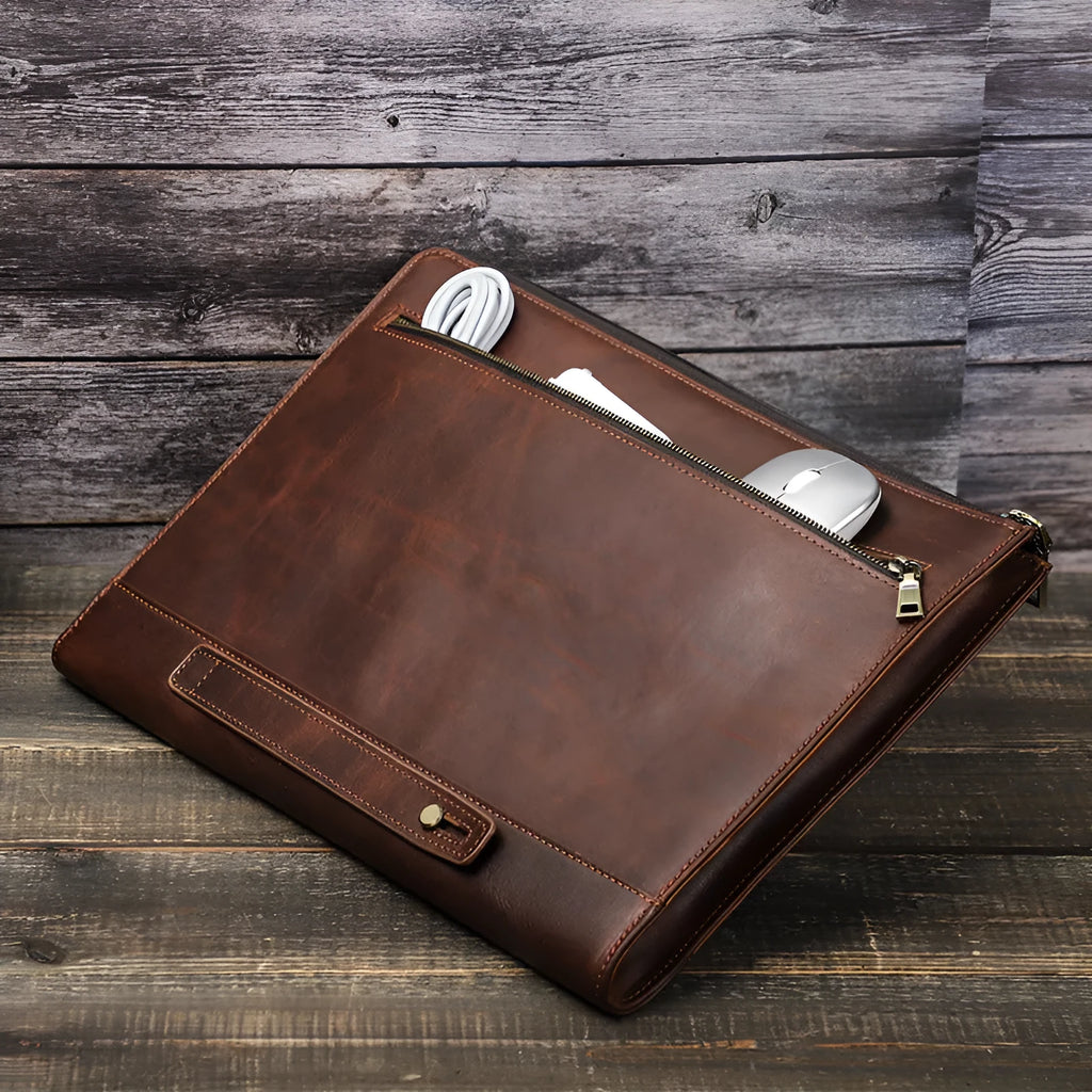 Crazy Horse oil leather laptop bag in coffee colour with zipper closure on white background
