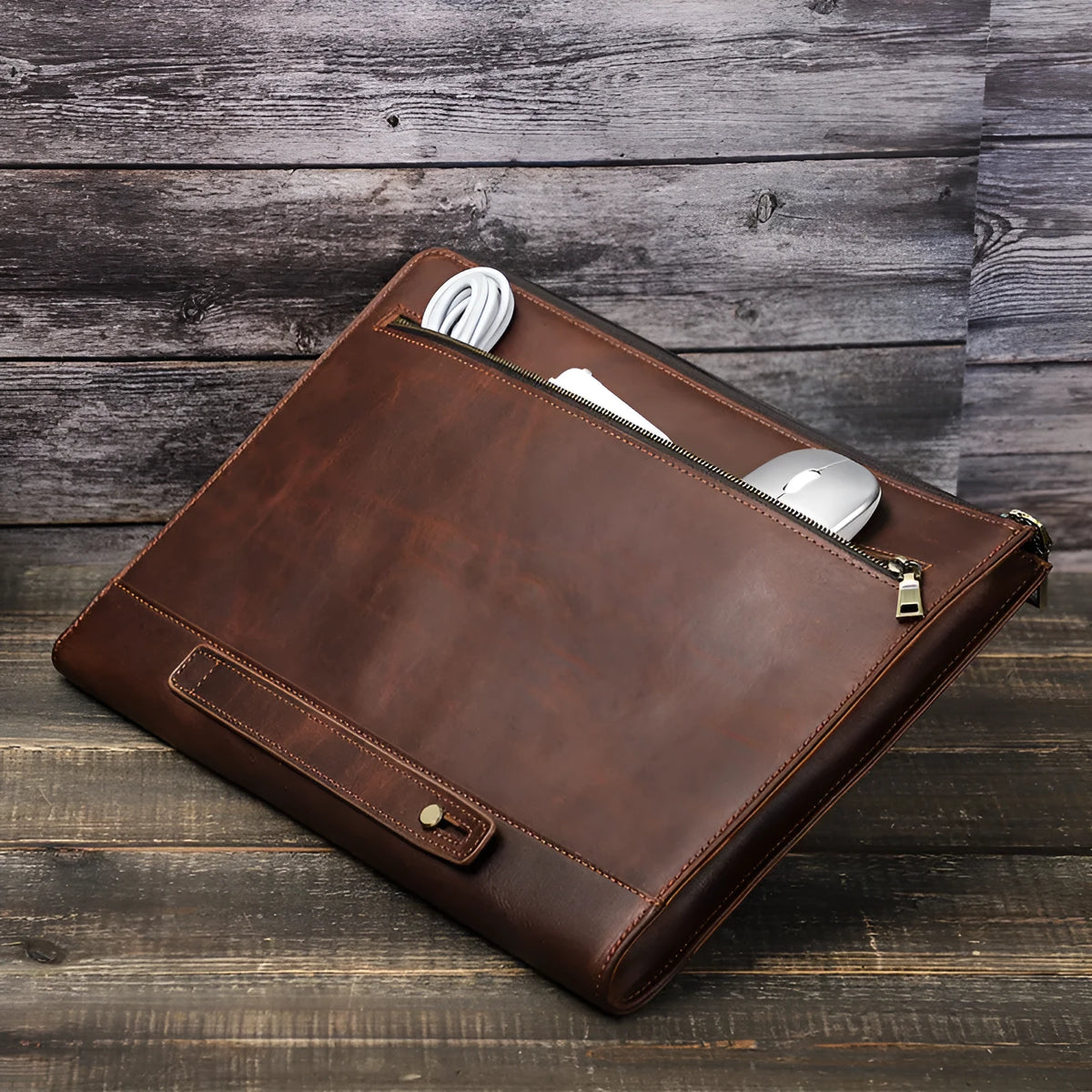 Crazy Horse oil leather laptop bag in coffee colour with zipper closure on white background