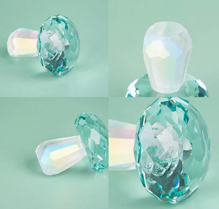Colourful transparent crystal mushroom decoration on a white background.