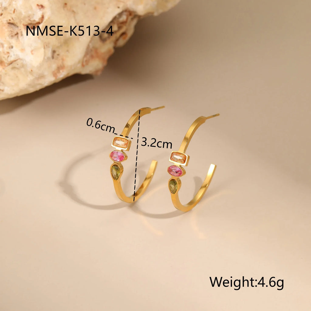 Geometric gold plated jewellery set with necklace, ring, and earrings featuring zircon elements
