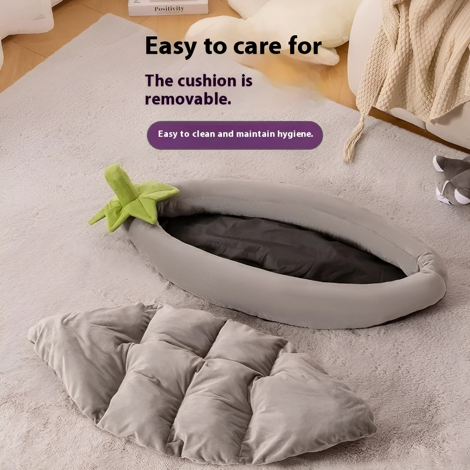 Washable dog mat pet bed in purple colour, shown in a home setting next to a small dog.