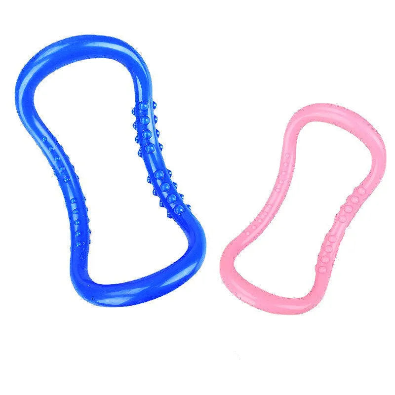 Purple, blue, and pink PP plastic yoga ring for stretching and back exercises.